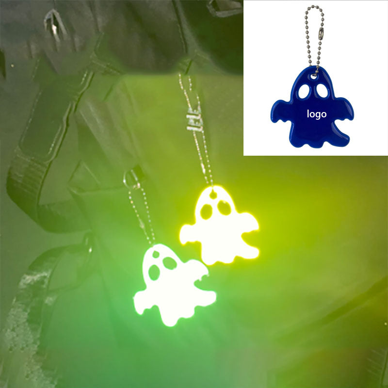 Reflective ghost charm
